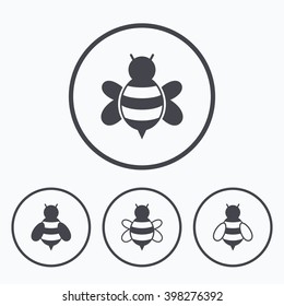 Honey bees icons. Bumblebees symbols. Flying insects with sting signs. Icons in circles.