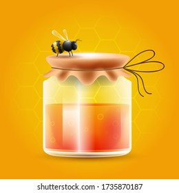 Honey container with bee on top of the container