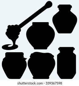 Honey dipper and honey in jar. Isolated on blue background. Vector silhouettes