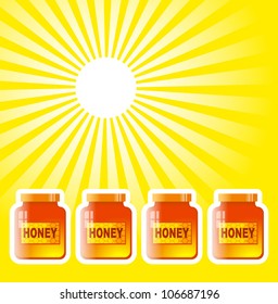 Honey jar on yellow background