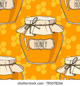 Honey jars and honeycomb seamless pattern. Vector hand drawn background illustration.