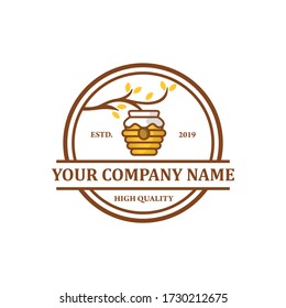 Honey logo design, with honeycomb hangs on a tree.