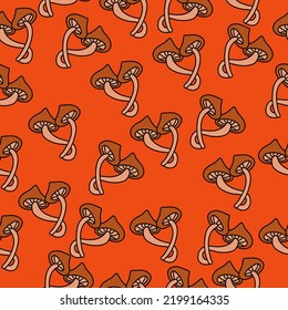 Honey mushrooms seamless pattern, pair of mushrooms on orange background vector illustration