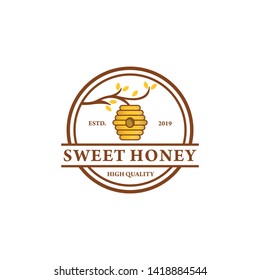 Honeycomb hanging on a branch logo design