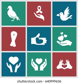 Hope icons set. set of 9 hope filled icons such as dove, ribbon, heart on hand, hands holding heart
