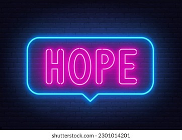 Hope neon sign in the speech bubble on brick wall background.