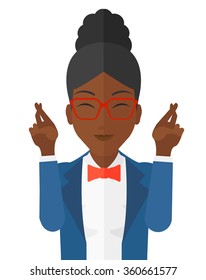 Hopeful woman keeping fingers crossed.