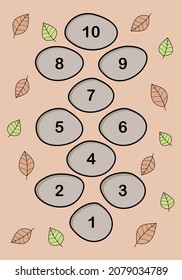 Hopscotch game drawn on stones on the ground and surrounded by autumn leaves
