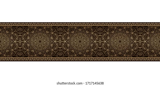 Horizontal border with a gold pattern from an openwork mandala on a dark background.