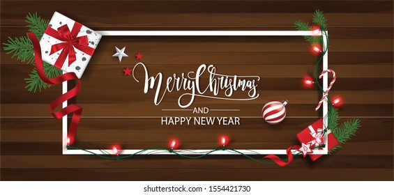 Horizontal Christmas and Happy New Year banner Xmas sparkling lights garland with gifts box greeting cards, headers, website Objects viewed from above. Flat lay,Top view elements for promotion 