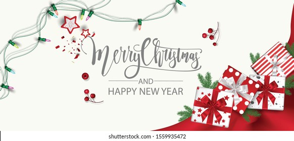 Horizontal Christmas and Happy New Year banner Xmas sparkling lights garland with gifts box greeting cards, headers, website Objects viewed from above. Flat lay,Top view elements for promotion 

