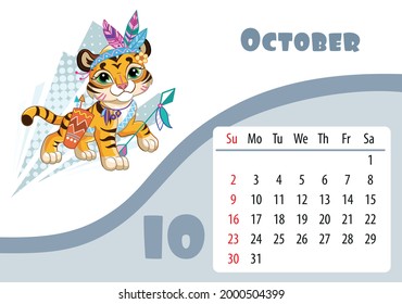 Horizontal Desktop Childrens Calendar Design For October 2022, The Year Of The Tiger In The Chinese Calendar. Cute Tiger Cub In Halloween Indian Costume. Vector Illustration. Week Start In Sunday.