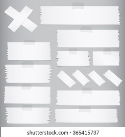 Horizontal and different size sticky tape, adhesive pieces on gray background