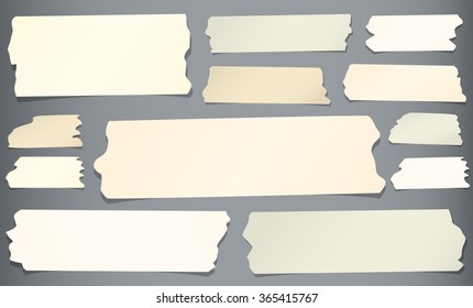Horizontal and different size sticky tape, adhesive pieces on gray background