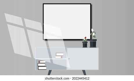 Horizontal empty painting, picture frame on gray wall. Window light on frame. Shadow overlay. Furniture, books, plants. Home decoration, advertisement concepts.