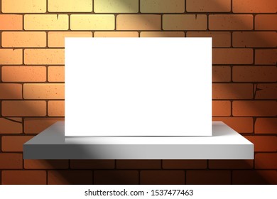A horizontal empty postcard or sheet of paper is standing on a shelf near a red brick wall. Light from the window creates oblique shadows. Mockup for design