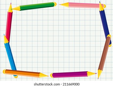 horizontal frame of colored pencils on notebook sheet