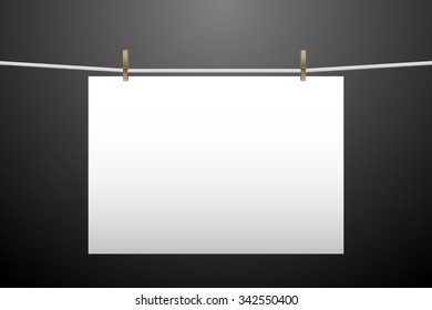 Horizontal hanging paper. Vector illustration isolated on dark background for templates, mock ups and backgrounds