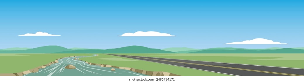 Horizontal or landscape of smooth asphalt road beside a river. Surrounded by green grass with mountain under the blue sky and white clouds.