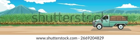 Horizontal or Landscape view of dirt road with a background of sugarcane farmland. Pickup trucks for agriculture. Driving man in side car. Background of mountain under blue sky and white clouds.