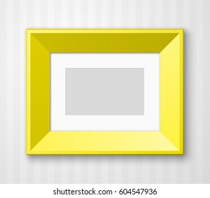 Horizontal Photo frame with paper passepartout for picture hanging on wall with striped wallpaper background.