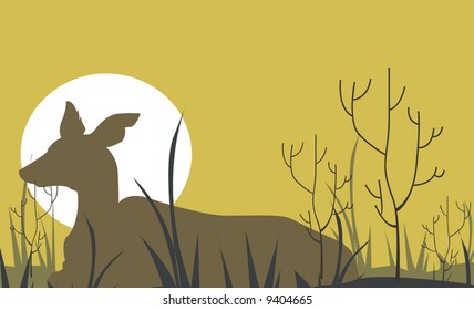  horn dear resting in a grass land	