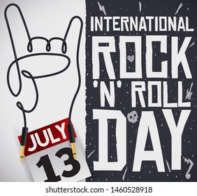 Horn sign made with guitar wire, a calendar with reminder date and greeting sign over blackboard, decorated in hand draw style and doodles to celebrate International Rock "N" Roll Day.