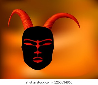 Horned mask ritual antique in African style. Black mask with Golden horns.