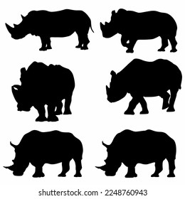 horned rhinoceros set, silhouettes, on white background