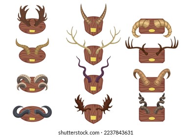 Horns of different wild animals vector illustrations set. Cartoon drawings of horns of different shapes, deer, moose, stag on wooden boards isolated on white background. Wildlife, hunting concept