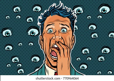 Horrible background with eyes and a frightened man. Pop art retro vector illustration