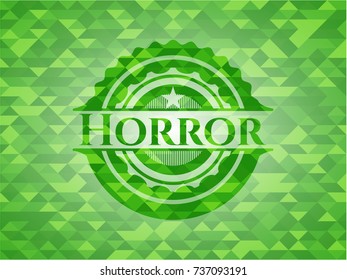 Horror realistic green emblem. Mosaic background
