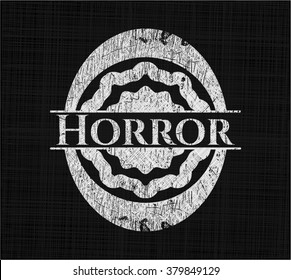 Horror written on a blackboard