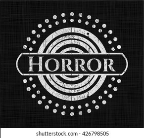 Horror auf der Tafel geschrieben