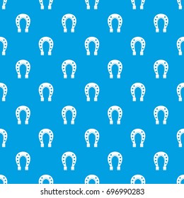 Horse shoe pattern repeat seamless in blue color for any design. Vector geometric illustration
