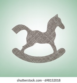 Horse toy sign. Vector. Brown flax icon on green background with light spot at the center.