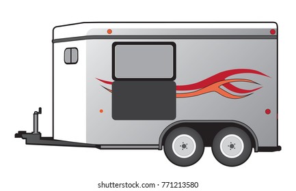 A horse trailer with orange and red graphics is ready to hook up and go