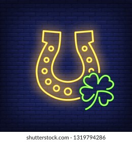 Horseshoe and clover leaf neon sign. Saint Patricks Day design. Night bright neon sign, colorful billboard, light banner. Vector illustration in neon style.