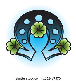 Horseshoe and clover leaves illustration in an old school tattoo style.
