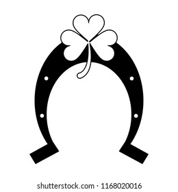 Horseshoe and clover symbol in black and white