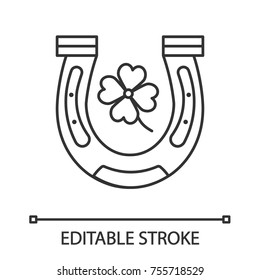 Horseshoe and four leaf clover linear icon. Symbols of success and good luck. Thin line illustration. Contour symbol. Vector isolated outline drawing. Editable stroke
