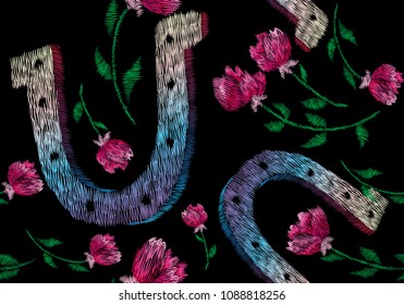 horseshoe for good luck. Space, stars, planets. Traditional folk stylish stylish embroidery stitch on a black background. Sketch for printing on clothing, fabric, bag, accessories and design. vector
