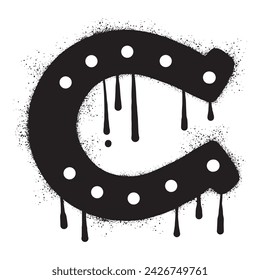 Horseshoe graffiti drawn with black spray paint