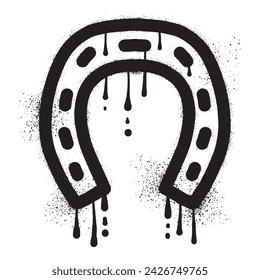 Horseshoe graffiti drawn with black spray paint