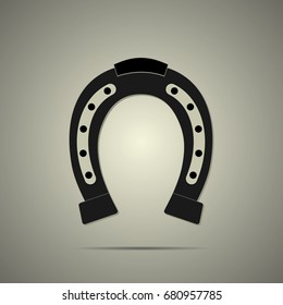 Horseshoe icon in flat style with shadow, black and white colors