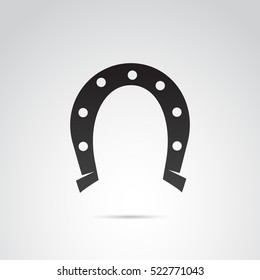 Horseshoe icon on white background. Vector art.