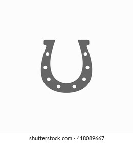 Horseshoe icon. Silhouette horseshoe. Horseshoe isolated on background