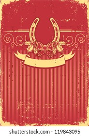 Horseshoe on vintage red christmas background with holly berry decoration