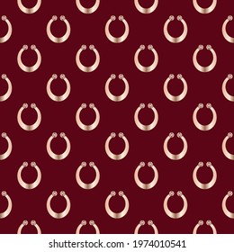Horseshoe. Ornament from a gold horseshoe on a red background. Seamless scalable pattern.
