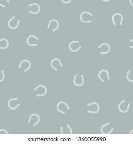 Horseshoe silhouette seamless pattern. Vector illustration.